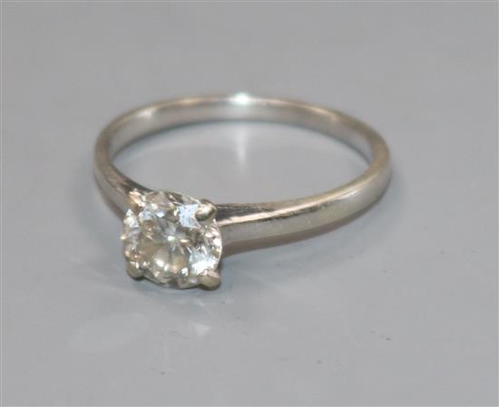 A 9ct white gold and solitaire diamond ring, size M.